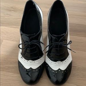 Black and white Patton shoes